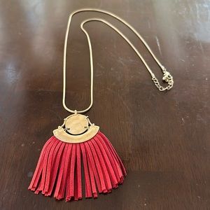 gold and red necklace